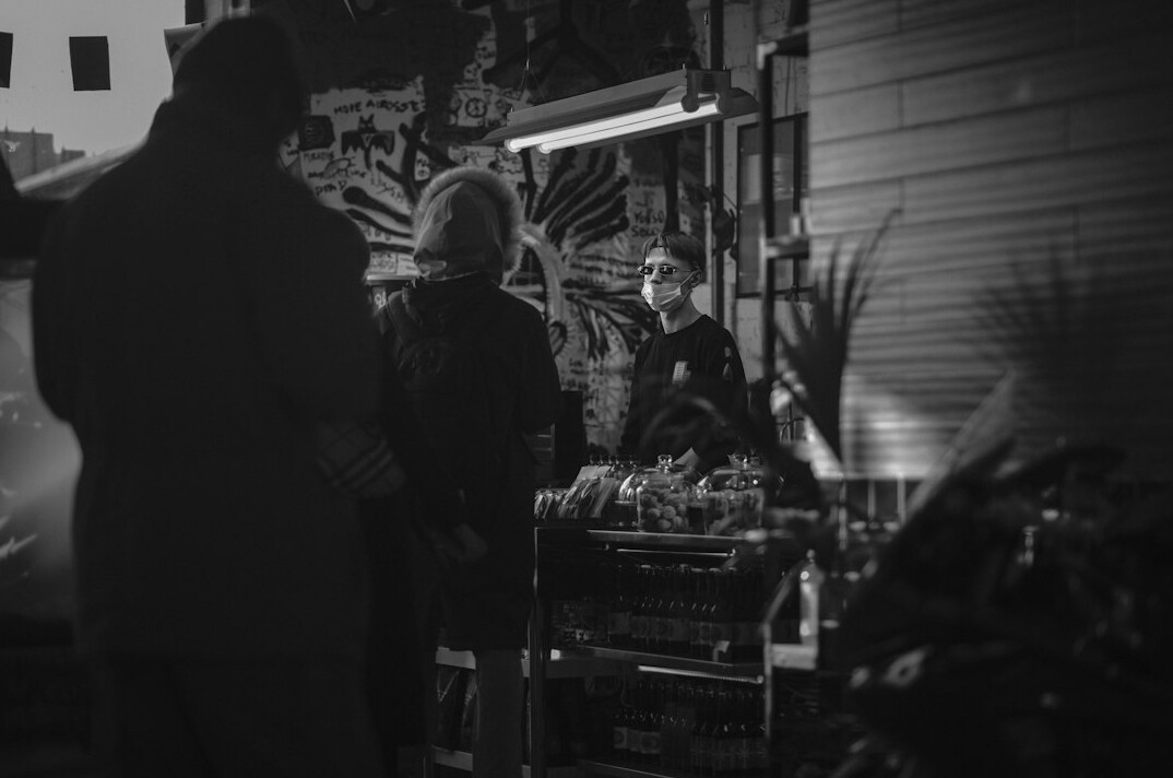 store detective watching shoplifters